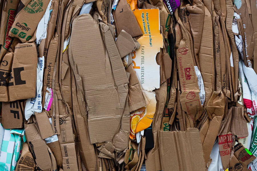 Compacted cardboard and plastic waste